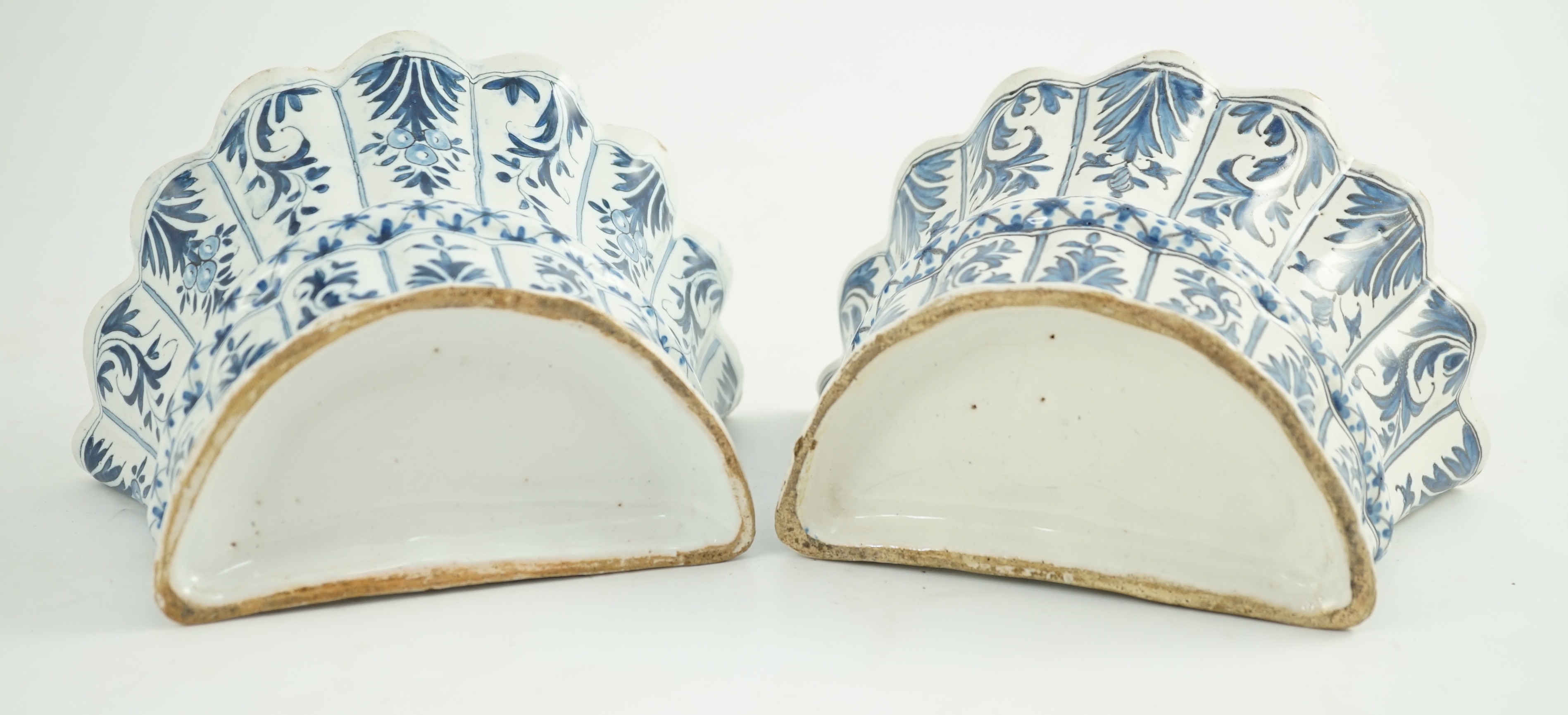 Two similar 18th century Delft blue and white hanging bough pots, 18.3cm wide